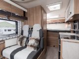 You have a transverse double bed at the back of the 2018 Swift Rio 325