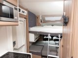 The drop-down double bed in the Swift Escape 685 is manually operated, is accessed by a ladder and has a comfy Duvalay Duvalite mattress