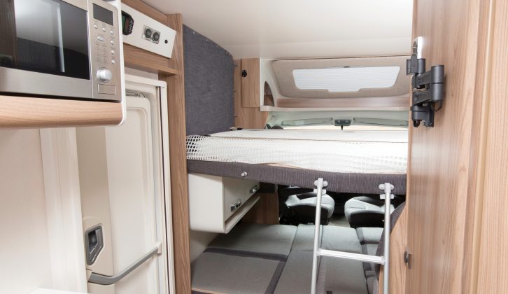 The drop-down double bed in the Swift Escape 685 is manually operated, is accessed by a ladder and has a comfy Duvalay Duvalite mattress