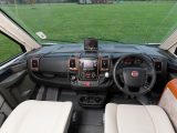 With a top-mounted reversing camera and those metallic brown infills, the dashboard isn’t the neatest one we’ve ever seen