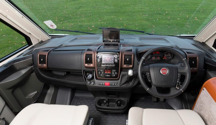 With a top-mounted reversing camera and those metallic brown infills, the dashboard isn’t the neatest one we’ve ever seen