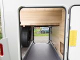 Two large doors allow easy access to the garage, which is big enough to hold a pair of bicycles