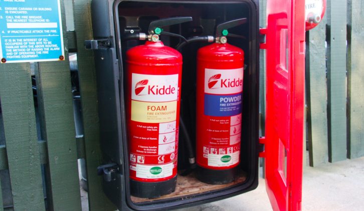 Fire extinguishers are colour coded – here are cream (foam) and blue (powder) examples
