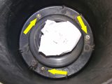 The arrows above point to the three retaining nuts that need to be removed – the rag is to catch any dropped nuts!