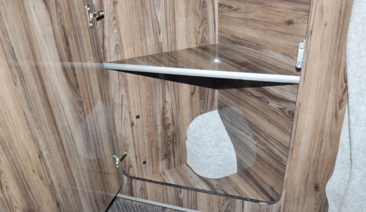 The leading edge of the kitchen unit helps optimise floor space, but there’s still handy storage available in this shelved cupboard – read more in our full motorhome review