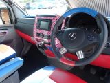 Flags and blue, red and white leather make a dazzling combination in the cab!