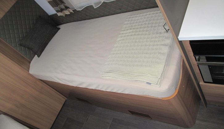Both the rear fixed single beds measure 2.03 x 0.8m/6’8” x 2’8”, have storage beneath and can be raised at the head end