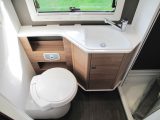 There's a Thetford electric-flush swivel toilet and a smart sink in the Adria's end washroom