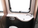 There's a swivel cassette toilet and a good-sized basin in the Auto-Trail Imala 732's central washroom
