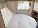 The island bed in the master suite is 1.86 x 1.34m (6'1" x 4'4") and with windows on two sides, it's a light and bright room