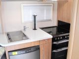 As well as a separate oven and grill, there is a microwave in the kitchen