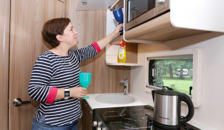 Storage space in the kitchen is in short supply, but it's a practical and well-thought-out area