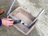 Use a brush and paraffin to remove the build-up of grease and road silt on any affected part of the step assembly
