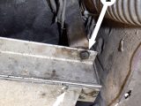1 shows the bolt attaching the step frame to the floor of the vehicle – there are four, one on each corner of the step frame.
2 – note the screw (x2) securing the protection plate to the step side extrusions