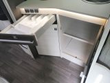 Under the worktop is a pull-out cutlery tray and two cupboards, one of which would be taken up by the Thetford oven/grill in a UK ’van