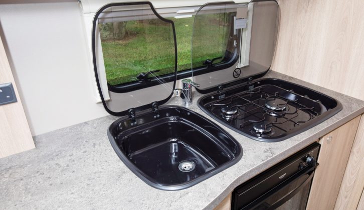 The sink and hob are both finished in smart black enamel, which not only looks good, but should also prove easy to keep clean