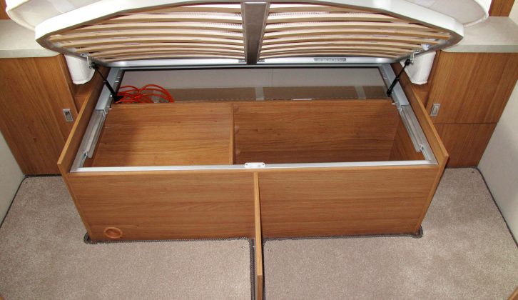 There is a good amount of storage space under the fixed island bed at the rear