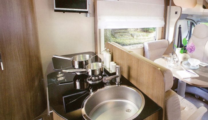 The Welcome Suite is packed with natty features, such as this island kitchen – it also has a fold-away outside hob for cooking al fresco