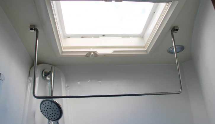 As well as a rooflight, there is also a handy fold-down hanging rail in the shower cubicle