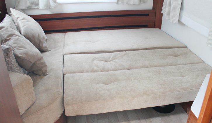 The rear double bed is easy to make up using slide-out slats and the long and comfy sofa cushions