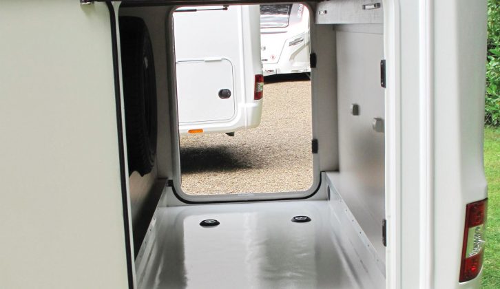 Access to the rear garage is made simple by its two doors, and there is enough room to store bicycles and other large items with ease