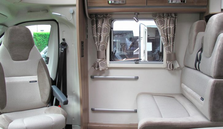 This example has the half-dinette lounge which means there are a total of four belted travel seats in this Swift motorhome