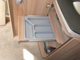Space under the worktop opens out with a cutlery tray and three shelves, although the Alde heater takes up the lower part