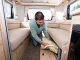 The underseat areas in the rear lounge are mostly clear for storage – a fold-down front panel allows you to load them with ease