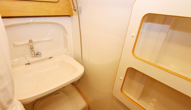 The well-equipped washroom looks less clinical than many and features this foldaway sink