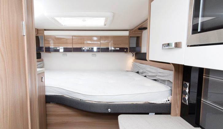 You can manually raise the bed for more space in the rear garage