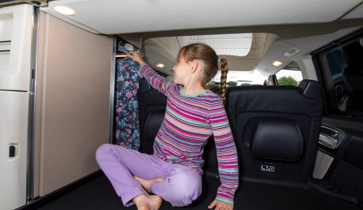 It’s a little awkward to reach the double-doored wardrobe from the rear seats – you can access it via the load bay, though, which is easier