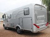 Large doors on either side provide access to this motorhome's garage