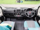 The cab is a standard Fiat Ducato layout and the seats only have one armrest, but this does make it easier to swivel them around for lounge seating