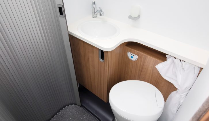 Slide away this tambour door to create even more space when the  washroom isn't in use