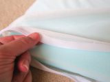 The memory-foam topper comes in its own zipped washable protector