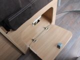 This drop-down flap opens to reveal more storage under the dinette seating