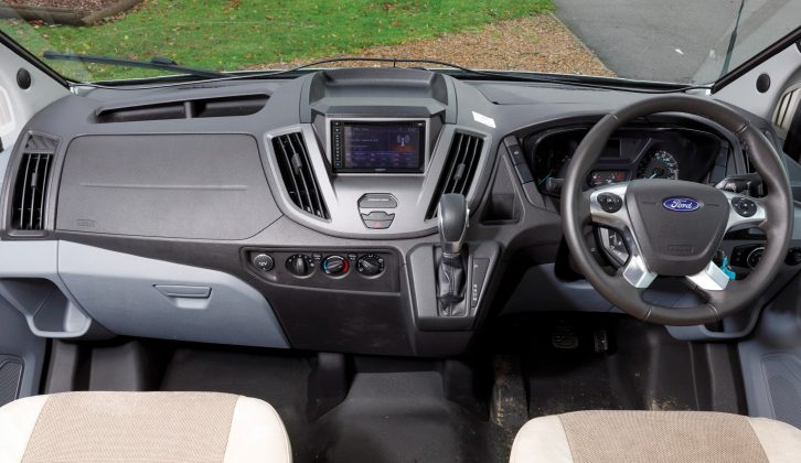 The Ford Transit cab is designed to feel much more like a car’s, and we particularly like the position of the drinks holder up by the steering wheel