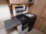 There's also a three-burner hob, a combined oven and grill, and a 95-litre fridge in the Bailey Advance 66-2's offside kitchen