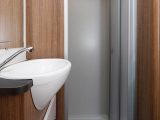 There is also a separate shower cubicle with a single plughole in the full-width end washroom
