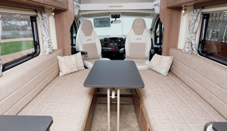 There's plenty of space to dine around the freestanding table – mind the step up in to the Bailey Advance 66-2's cab