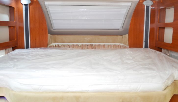 There is no need to remove the headrests to lower the drop-down double bed