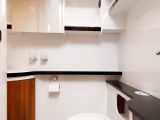 There's a good amount of storage in the Hobby Optima De Luxe T70F's washroom, including cupboards for loo roll and cleaning products