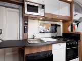 The lift-up worktop extension mens there's plenty of workspace in the Bailey Advance 70-6's kitchen