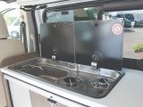 The kitchen of the R535 has a two-burner gas hob with Piezo ignition as well as a stainless-steel sink and a Webasto Isotherm fridge