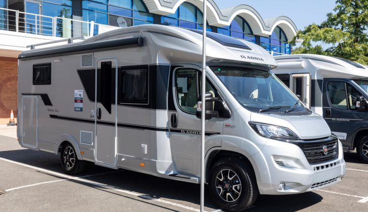 The coachbuilt Matrix 670 DC is a 7.50m-long island-bed four-berth 'van with Adria's new 'open salon' layout to give a more comfortable and social lounge