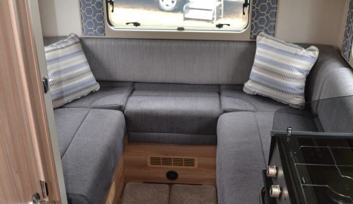 The Escape Compact C404 has a rear lounge with a drop down bed above