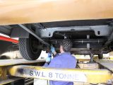 Servicing of the chassis must be carried out with the axle unladen