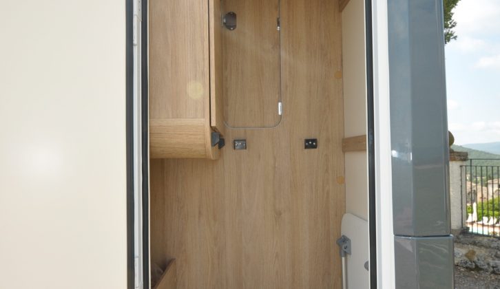 At the rear of the van is a generous storage space, which can be accessed internally via the washroom