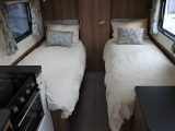 The fixed twin beds are an increasingly popular layout