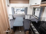 The rear lounge has a stow-away table, and overhead lockers give plenty of storage space